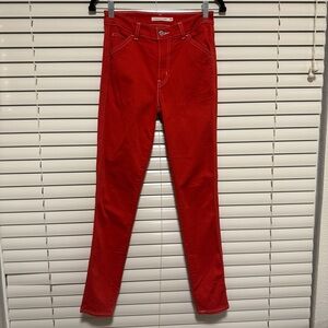 Vibrant Red Levi’s Skinny Jeans with Textured Appearance
